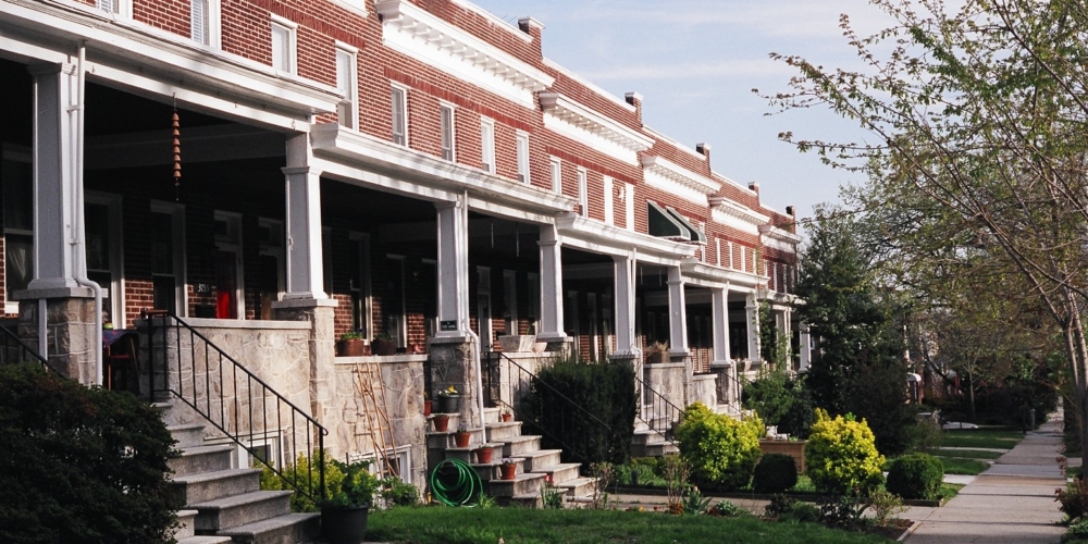Brick row houses with generous porches